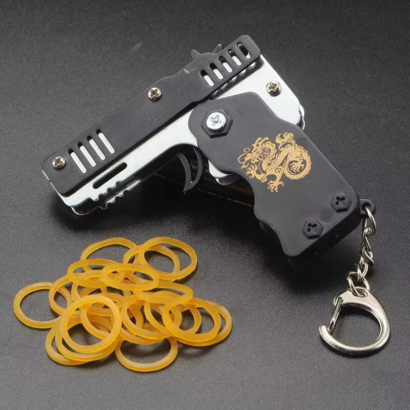 ミニゴムバンドガンキーホルダー – 男の子向け折りたたみ式フ - Home Security Gun のレビューと価格